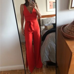 Red jumpsuit h:ours with slits